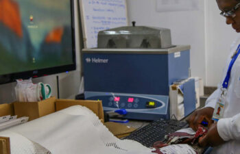 A lab technician doing blood tests jpg